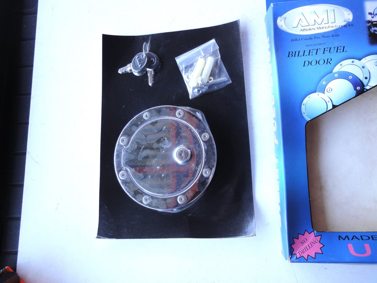 USA 未開封 AMI 6044CL ロッキング ダッジ デュランゴ ビレット フューエル ドア キャップ billet fuel door（5枚目）